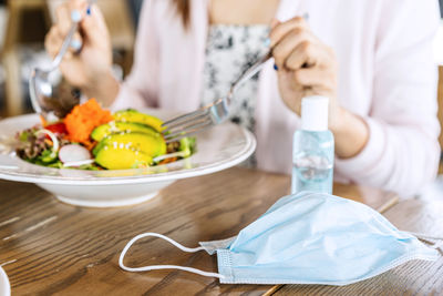 Midsection of woman preparing food