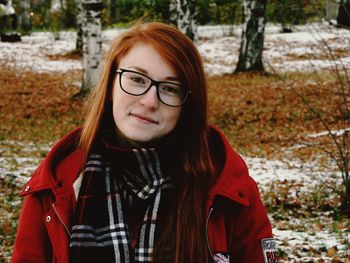 Portrait of young woman wearing eyeglasses during winter