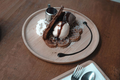 High angle view of ice cream in plate on table