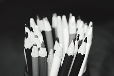 Close-up of pencils against white background