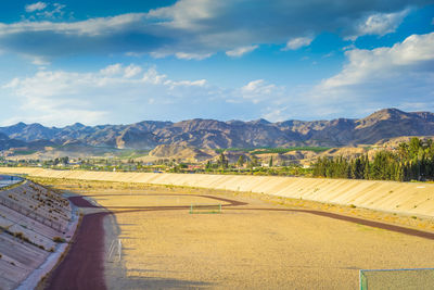 A football field on the mountains on the background a quiet and beautiful place for a football game