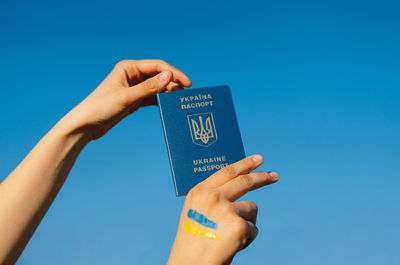 Ukrainian passport in hand ukrainian.