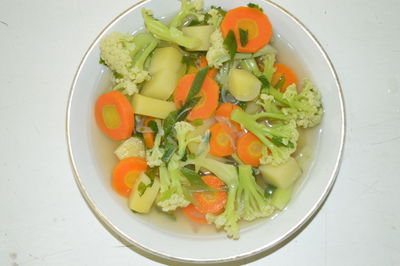 High angle view of salad in bowl on table