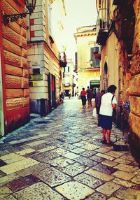 Narrow alley amidst buildings