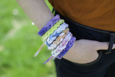 Close-up of hand holding purple leaf