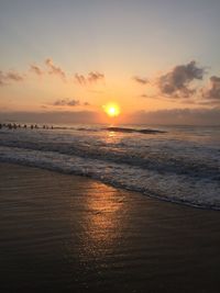 Scenic view of sunset over sea