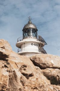 Low angle view of lighthouse against sky