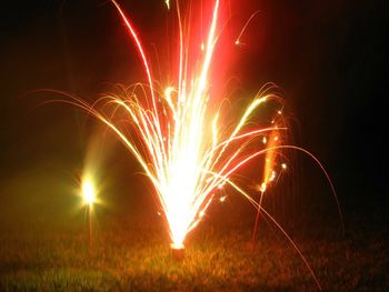 Firework display at night