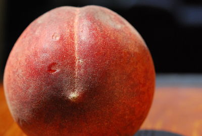 Close-up of apple on black background