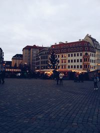 People walking on city street