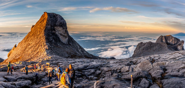 Scenic view of snow mountains against sky during sunset