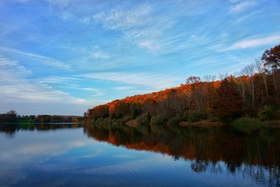 Scenic view of lake against sky during autumn