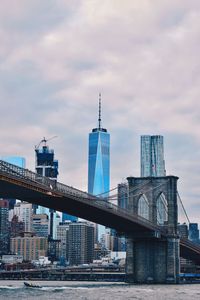 City skyline against cloudy sky