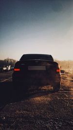 Car on street against clear sky