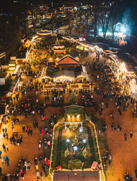 High angle view of illuminated buildings in city