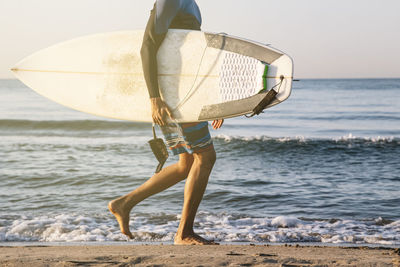 Full length of boy on beach