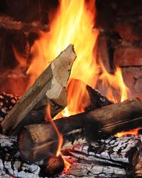 Close-up of bonfire on fire at night