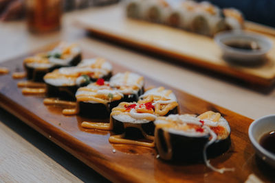 Close-up of sushi served on table