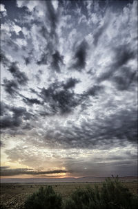 Scenic view of dramatic sky over sea