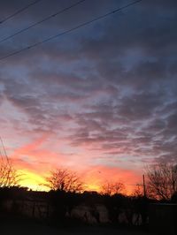 Scenic view of dramatic sky during sunset