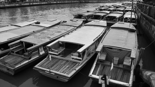 Boats moored at harbor