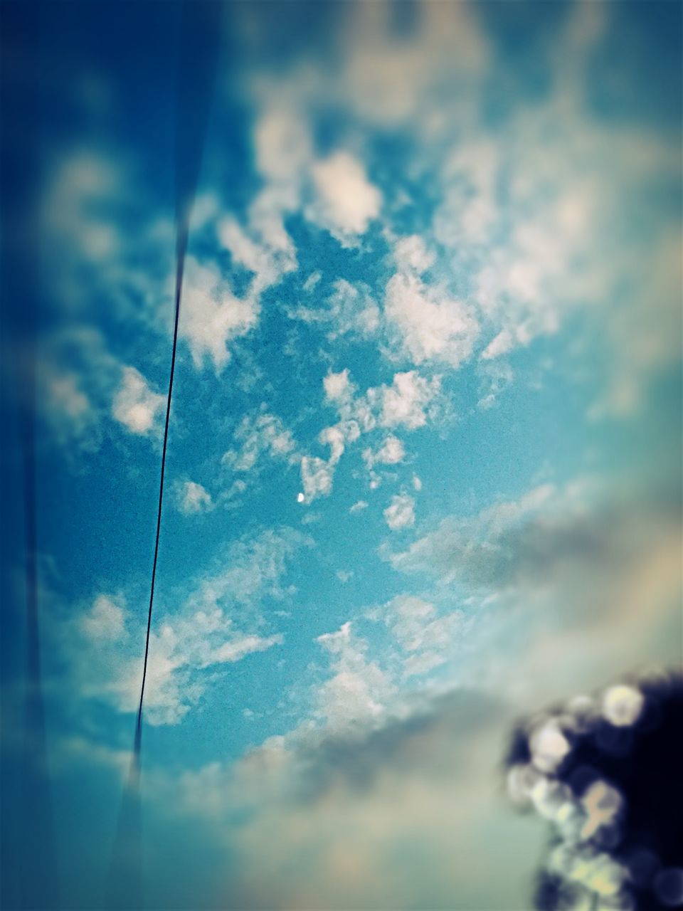 sky, low angle view, cloud - sky, cloudy, cloud, blue, nature, tranquility, beauty in nature, outdoors, street light, no people, dusk, electricity, day, weather, scenics, lighting equipment, tranquil scene, power line