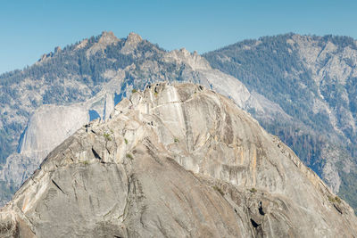 Panoramic view of rocky mountains against sky