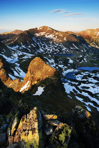 Scenic view of mountains against sky during winter