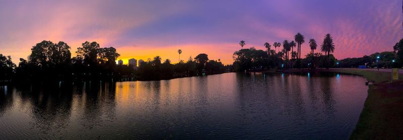 Panoramic view of lake against sky during sunset