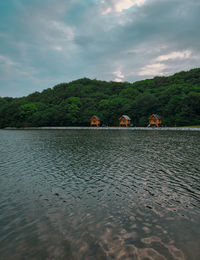 Scenic view of camp hut by the lake