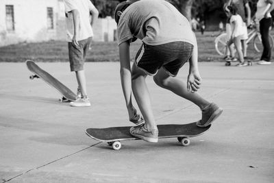 Child doing tricks with skateboard