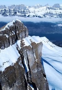 Scenic view of frozen lake against mountain