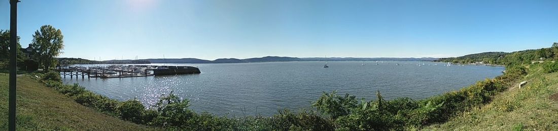 Scenic view of calm sea against clear sky