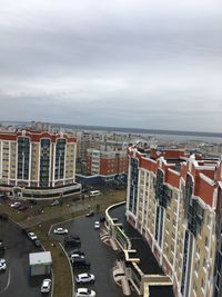 High angle view of street amidst buildings in city