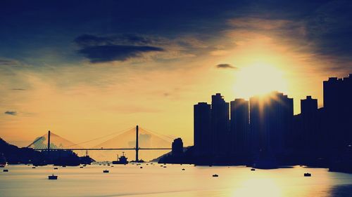 View of suspension bridge at sunset