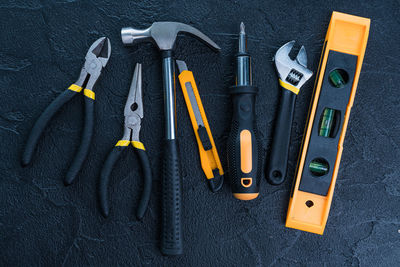 High angle view of work tools on table