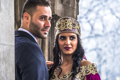 Bride with bridegroom during weeding ceremony