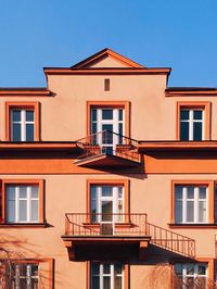 Low angle view of residential building against clear sky