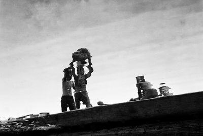 Low angle view of statue against sky