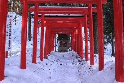 View of red building covered with snow