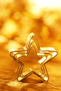 Close-up of star shape cookie cutters on table