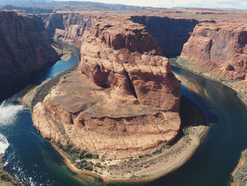 High angle view of horseshoe bend and river on sunny day