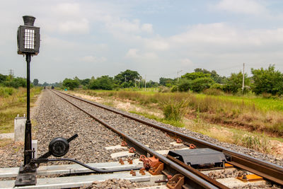 Train on railroad track against sky