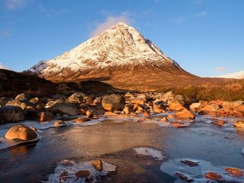 Higland in scotland an marvelous day. snowy cone of mountain stob dearg 1021 metres high. spring day