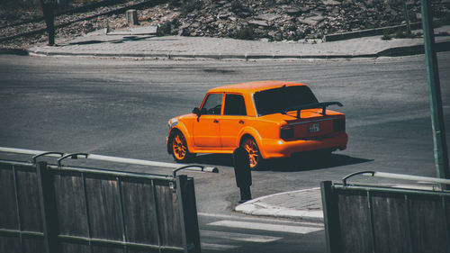 Yellow car on street