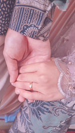 High angle view of woman with hands