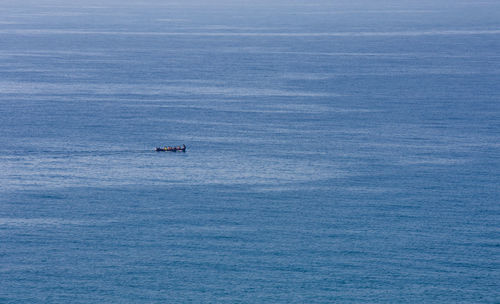 Boat sailing in sea