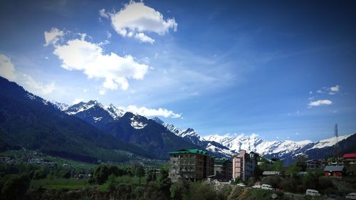 Scenic view of snowcapped mountains against sky