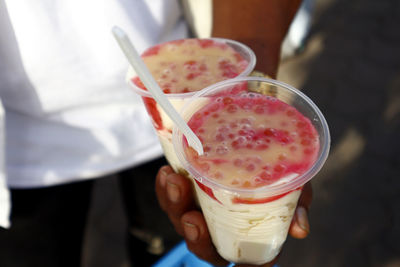 Close-up of woman holding ice cream