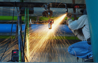 Man working on metal structure